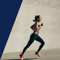 Eine Läuferin beim Lauftraining