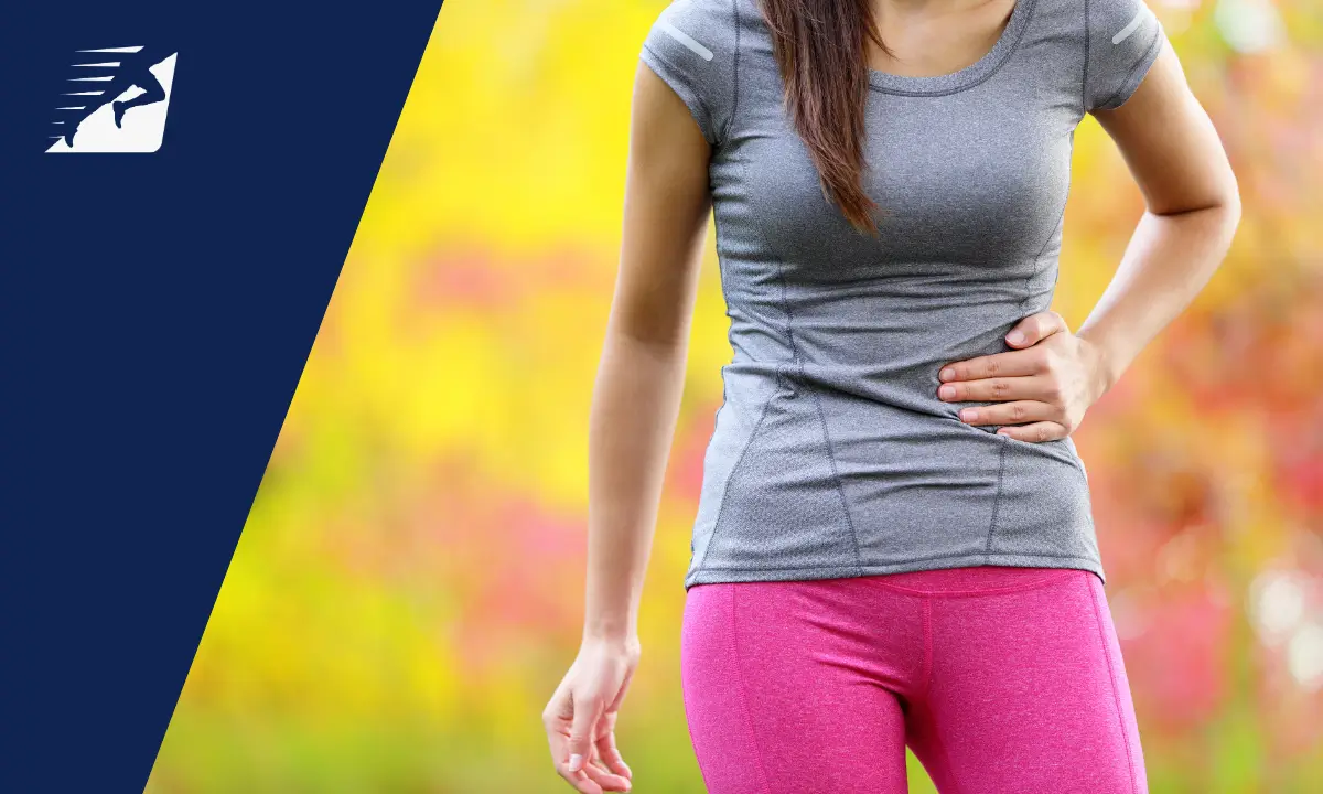 Eine Sportlerin  mit Seitenstechen