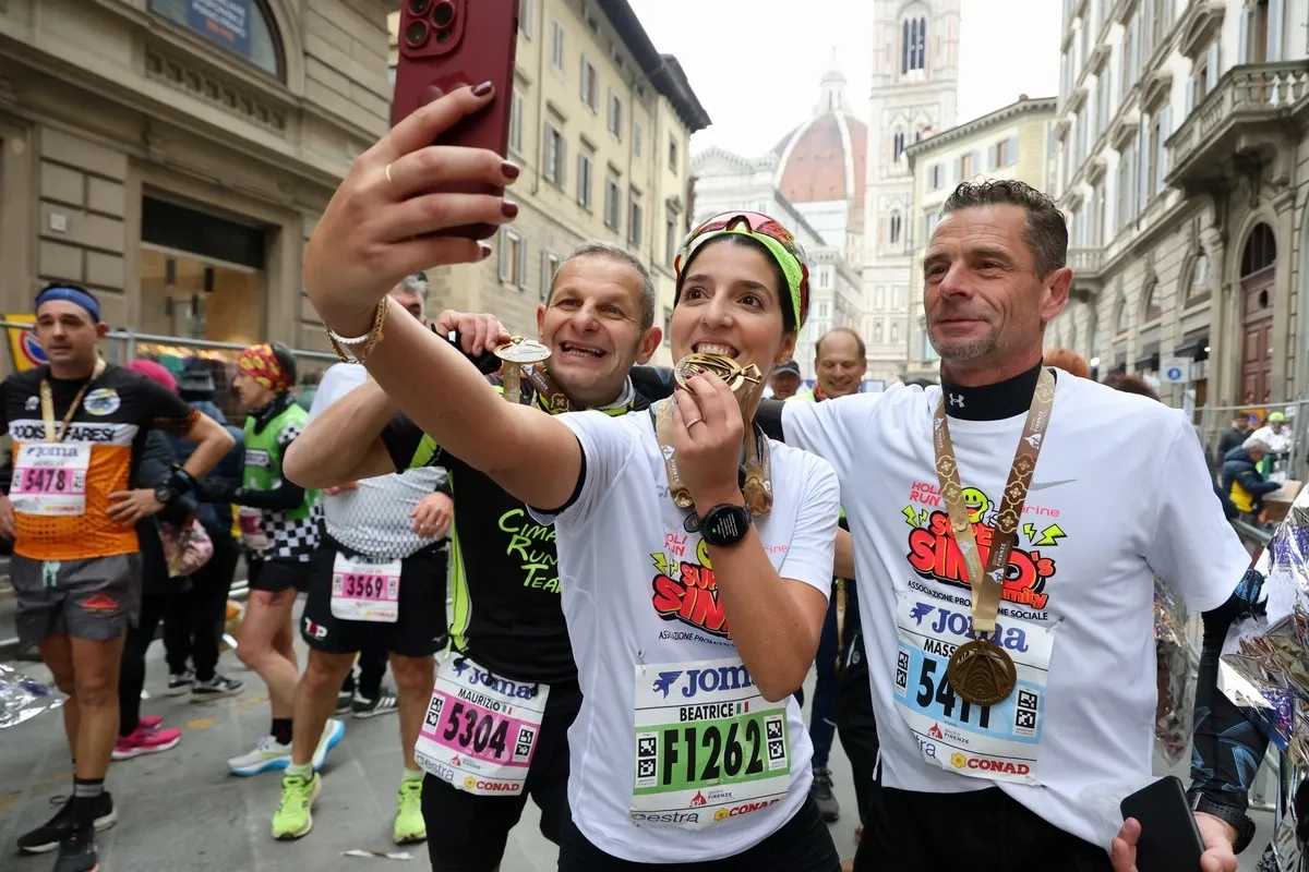 Zufrieden Gesichter nach dem Firenze Marathon